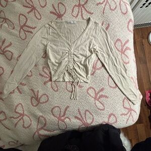 Elegant Cream Ruched Long Sleeve Top